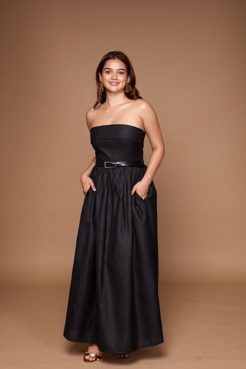 Poppy Black strapless maxi gown with slit by Mazikien, front view