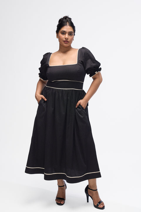 Tori Black with White Polka Dots polka dot puff-sleeve maxi dress by Mazikien, front view