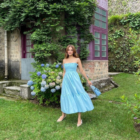 Monique Sky Blue tiered smocked midi sundress by Mazikien, front view