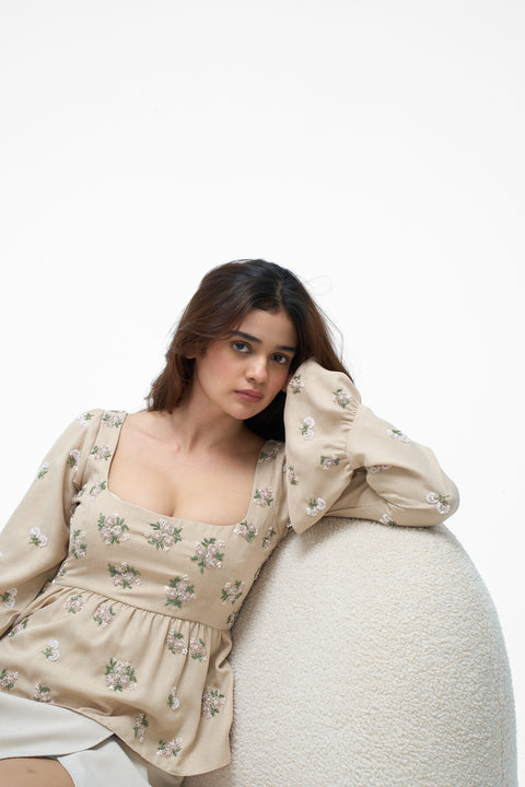 Sicily Beige floral embroidered bell-sleeve peplum top by Mazikien, front view