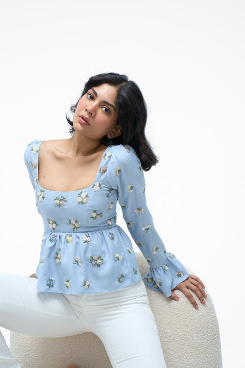 Sicily Blue floral embroidered bell-sleeve peplum top by Mazikien, front view