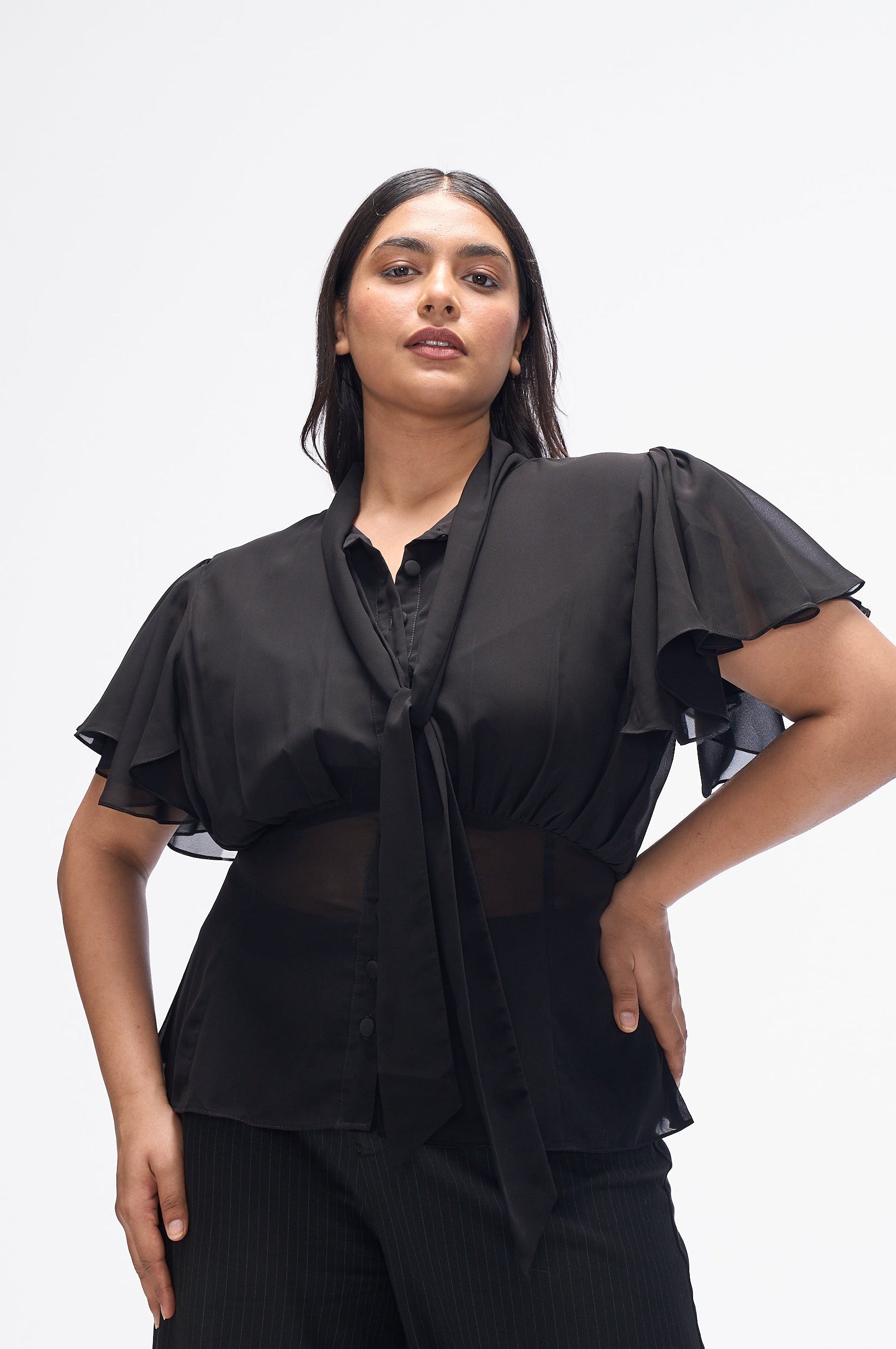 Melrose Black pussy-bow flutter-sleeve peplum blouse by Mazikien, view 6